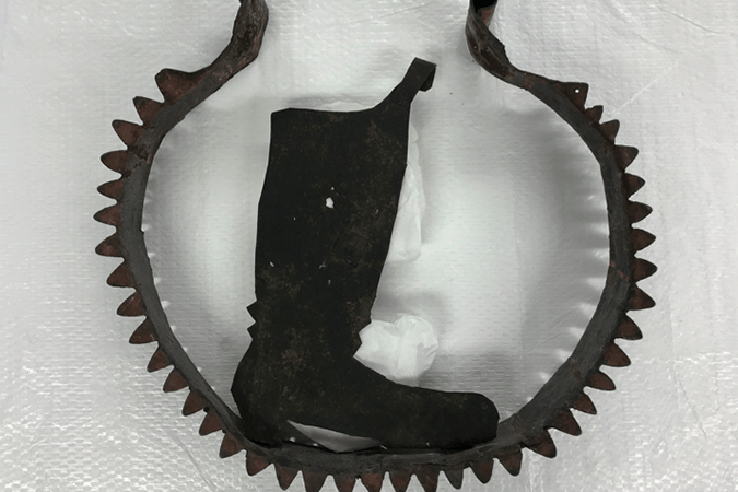Metal boot used for signage