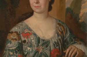 cropped area of 18th-century portrait, highlighting brightly-patterned woman's robe